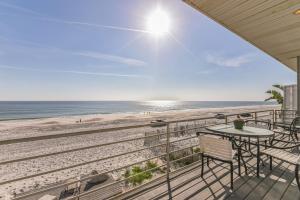 a view of the beach from the balcony of a beach house at Breathtaking Beach Front House home in St. Augustine