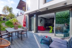 Χώρος καθιστικού στο Studio de 40m2 avec terrasse privée, gare à 5 min
