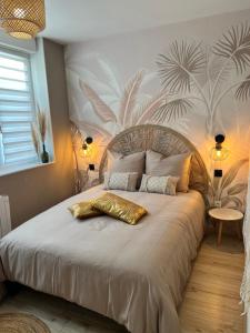 a bedroom with a large bed with a largeumedumedermott at - Nouveau - Bienvenue à Azelma - Cozy et proche de Naval Group in Cherbourg en Cotentin +14 photos