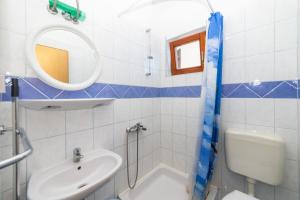 Koupelna v ubytování Apartments Palmero