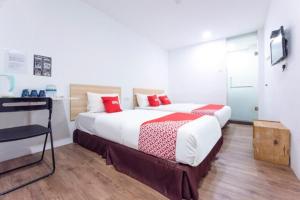 Postel nebo postele na pokoji v ubytování NORTH CITY HOTEL