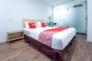 Postel nebo postele na pokoji v ubytování NORTH CITY HOTEL