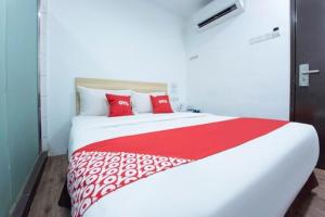 Postel nebo postele na pokoji v ubytování NORTH CITY HOTEL + 5 fotografií