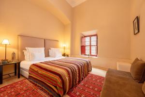 Ліжко або ліжка в номері Riad Dar Karma