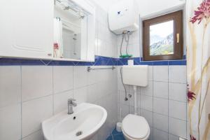 Koupelna v ubytování Apartments Palmero