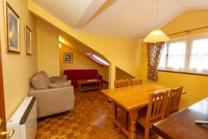 Zona de estar de Escuder Apartamentos Turísticos