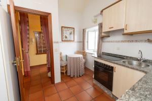 Una cocina o zona de cocina en Escuder Apartamentos Turísticos