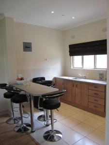 Kuchyň nebo kuchyňský kout v ubytování Victoria Apartments + 19 fotografií