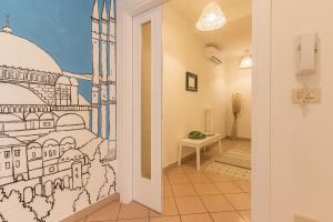 a hallway with a drawing of a bedroom at Palazzo Spada - Appartamento Cigno con 2 camere da letto in Codigoro