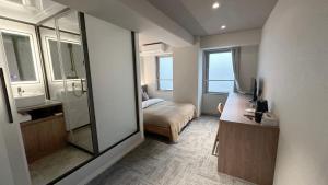 Cama o camas de una habitación en Lang Hotel Ueno 朝食付 #上野駅徒歩9分 #秋葉原浅草羽田&成田空港へ便利