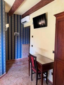 TV a/nebo společenská místnost v ubytování Ca' San Zaccaria