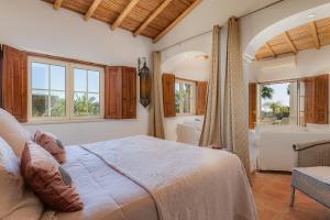 Ένα ή περισσότερα κρεβάτια σε δωμάτιο στο Quinta Paraiso -V024