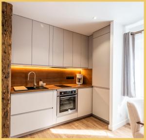 A kitchen or kitchenette at Appartement Montagne Cluses