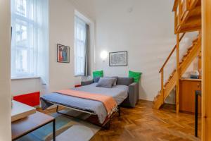 Posteľ alebo postele v izbe v ubytovaní Dorotea - Cosy Home in the heart of Budapest
