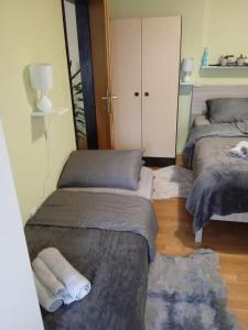 Postel nebo postele na pokoji v ubytování Krpan