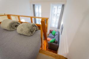 Posteľ alebo postele v izbe v ubytovaní Dorotea - Cosy Home in the heart of Budapest