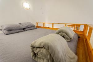 Posteľ alebo postele v izbe v ubytovaní Dorotea - Cosy Home in the heart of Budapest