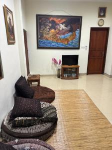 TV a/nebo společenská místnost v ubytování Nua House