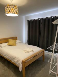 En eller flere senge i et værelse på Carbis Bay, St Ives Cornwall entire bungalow
