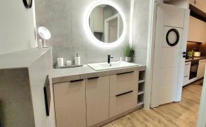 Kuchyň nebo kuchyňský kout v ubytování Apartament Gwiazda Jantaru by TriApart + 35 fotografií