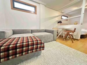 Luxury Suite - Corte Ingles Vigo tesisinde bir odada yatak veya yataklar