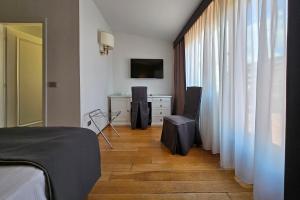 TV a/nebo společenská místnost v ubytování Hotel Atlantic Palace
