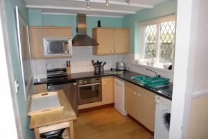 Kuchyň nebo kuchyňský kout v ubytování Cornstore