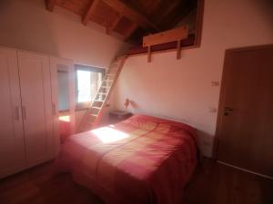 Llit o llits en una habitació de Il Rosmarino