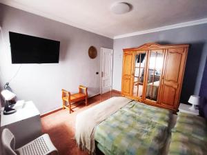 Postel nebo postele na pokoji v ubytování Rincón de Joel Habitación con baño privado