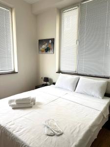 Katil atau katil-katil dalam bilik di Guest House Memo at the center of kutaisi