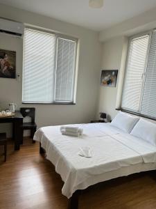 Katil atau katil-katil dalam bilik di Guest House Memo at the center of kutaisi