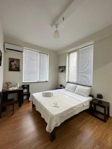 Katil atau katil-katil dalam bilik di Guest House Memo at the center of kutaisi