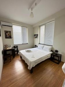 Katil atau katil-katil dalam bilik di Guest House Memo at the center of kutaisi