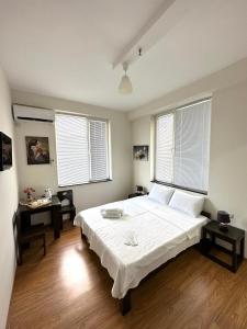 Katil atau katil-katil dalam bilik di Guest House Memo at the center of kutaisi