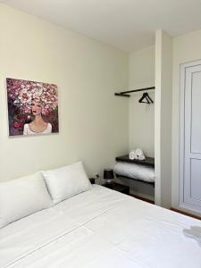 Katil atau katil-katil dalam bilik di Guest House Memo at the center of kutaisi