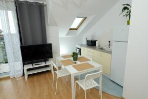 Kuchnia lub aneks kuchenny w obiekcie Apartament Słoneczny 7