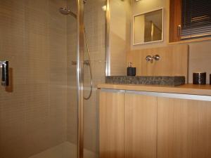 a shower with a glass door in a bathroom at Appartement Les Arcs 1800, 3 pièces, 4 personnes - FR-1-346-569 in Bourg-Saint-Maurice