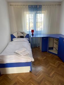Ένα ή περισσότερα κρεβάτια σε δωμάτιο στο Astralis Factory Apartments- FLY