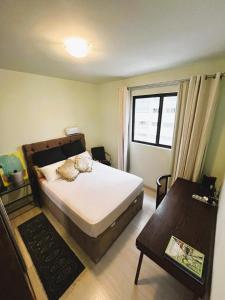 En eller flere senge i et værelse på ap ateliê amarelo manga