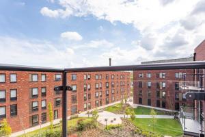 a view from the balcony of a brick building at Modern 2 bed 2 bath apartment in the heart of York in York