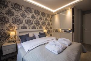 Postel nebo postele na pokoji v ubytování Apartview Bukowa III by Rent like home