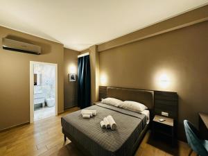 Voodi või voodid majutusasutuse Sunset Guest House toas