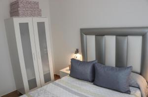 Posteľ alebo postele v izbe v ubytovaní Apartamento en Conil con piscina