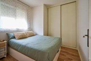 Postel nebo postele na pokoji v ubytování Oscars - Para familias con clase