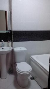 Vonios kambarys apgyvendinimo įstaigoje DestinationBTM Apartment in Batumi