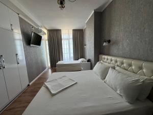 Postel nebo postele na pokoji v ubytování Espana aparthotel