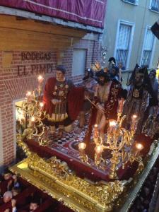 a group of people standing on a table with lights at Granada FreshApartments by Bossh! Apartments in M&aacute;laga