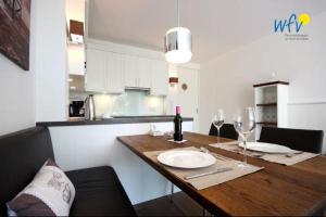 Η κουζίνα ή μικρή κουζίνα στο Haus Oldenburg Ferienwohnung 9 +28 φωτογραφίες