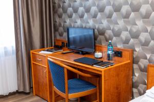 TV a/nebo společenská místnost v ubytování Hotel Rossija