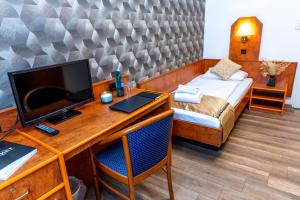 TV a/nebo společenská místnost v ubytování Hotel Rossija